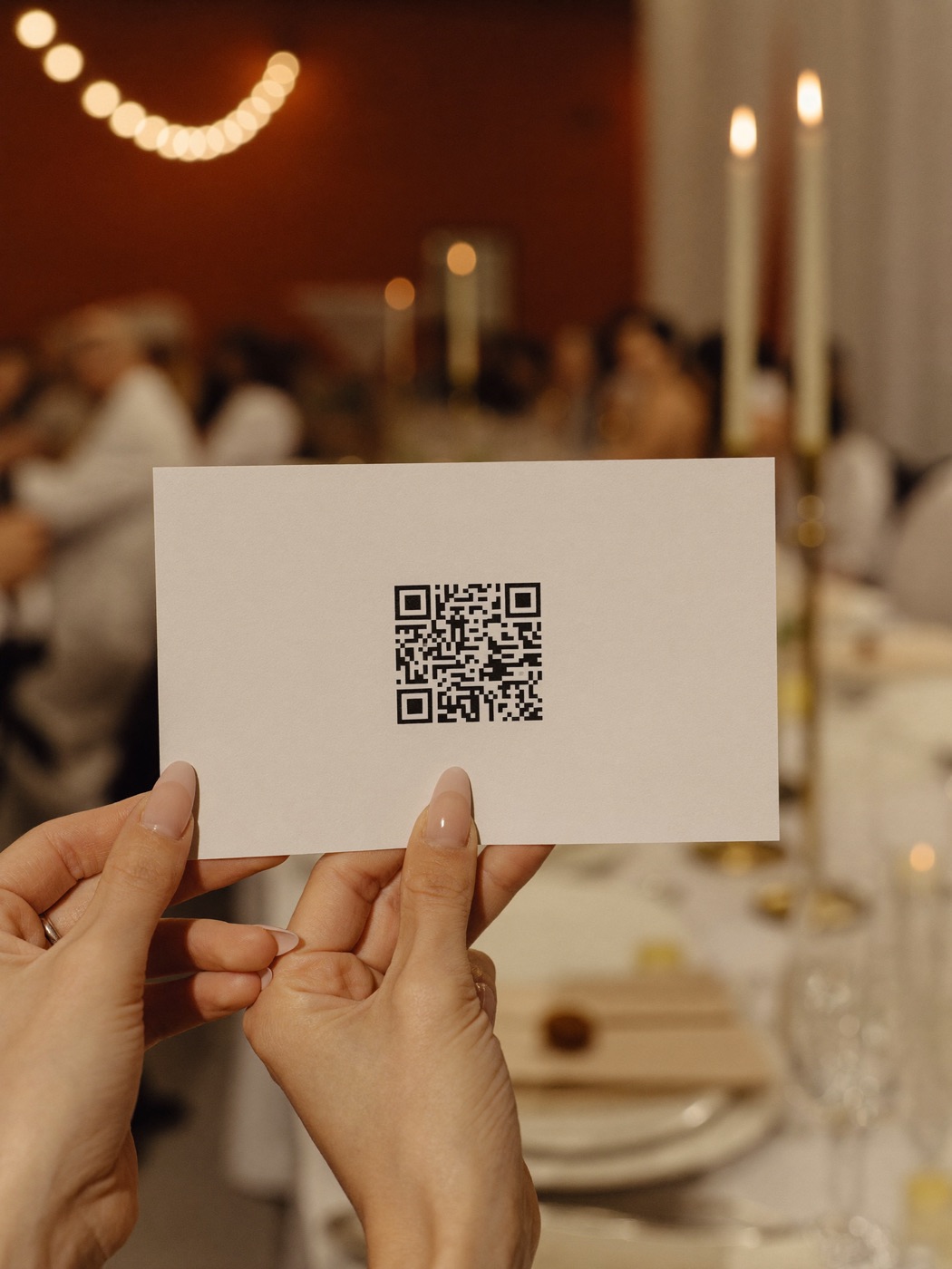 Elegant QR table card at a wedding reception
