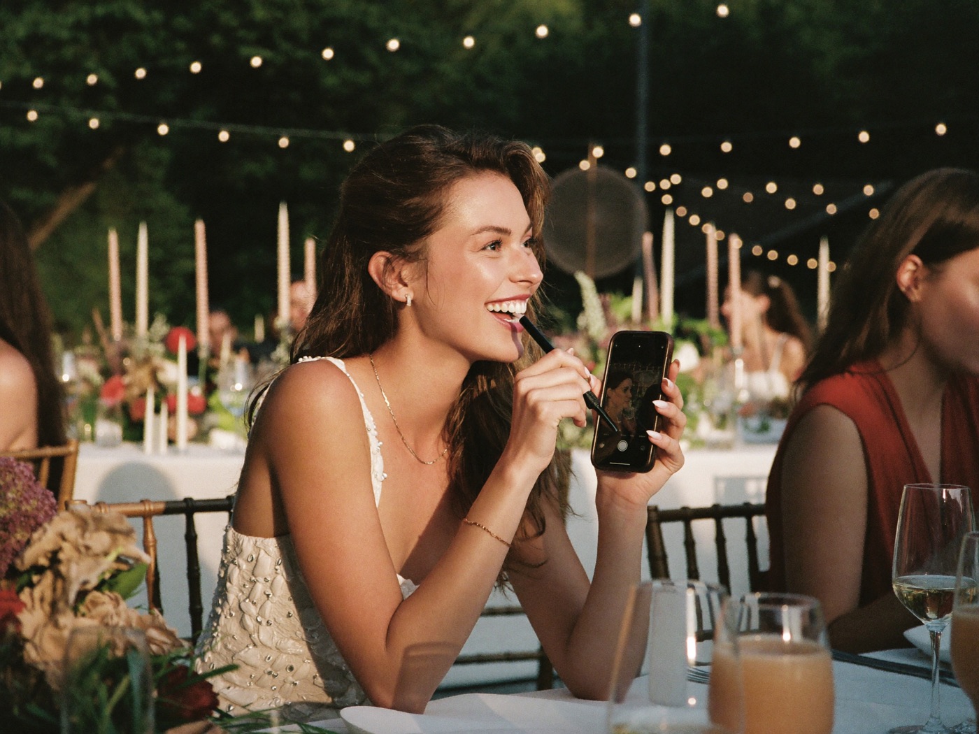 Guest recording a voice message at a wedding